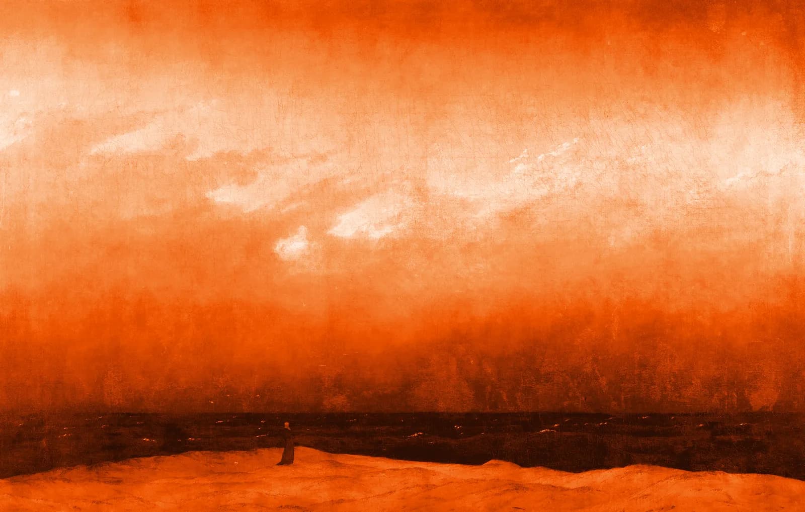 A small solitary figure on a shore beneath an enormous sky