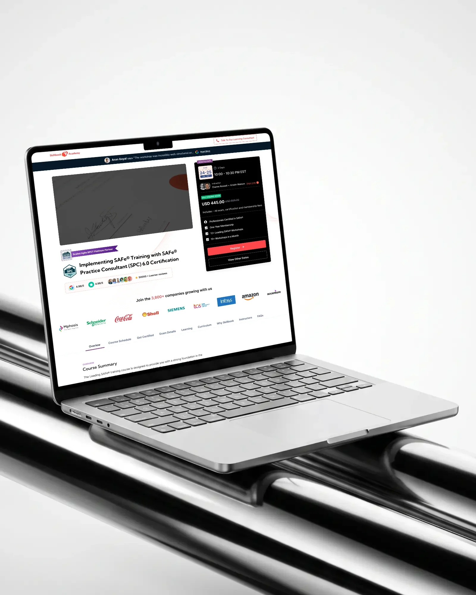 A Skillbook Academy course page for SAFe SPC certification on a laptop resting on chrome rails