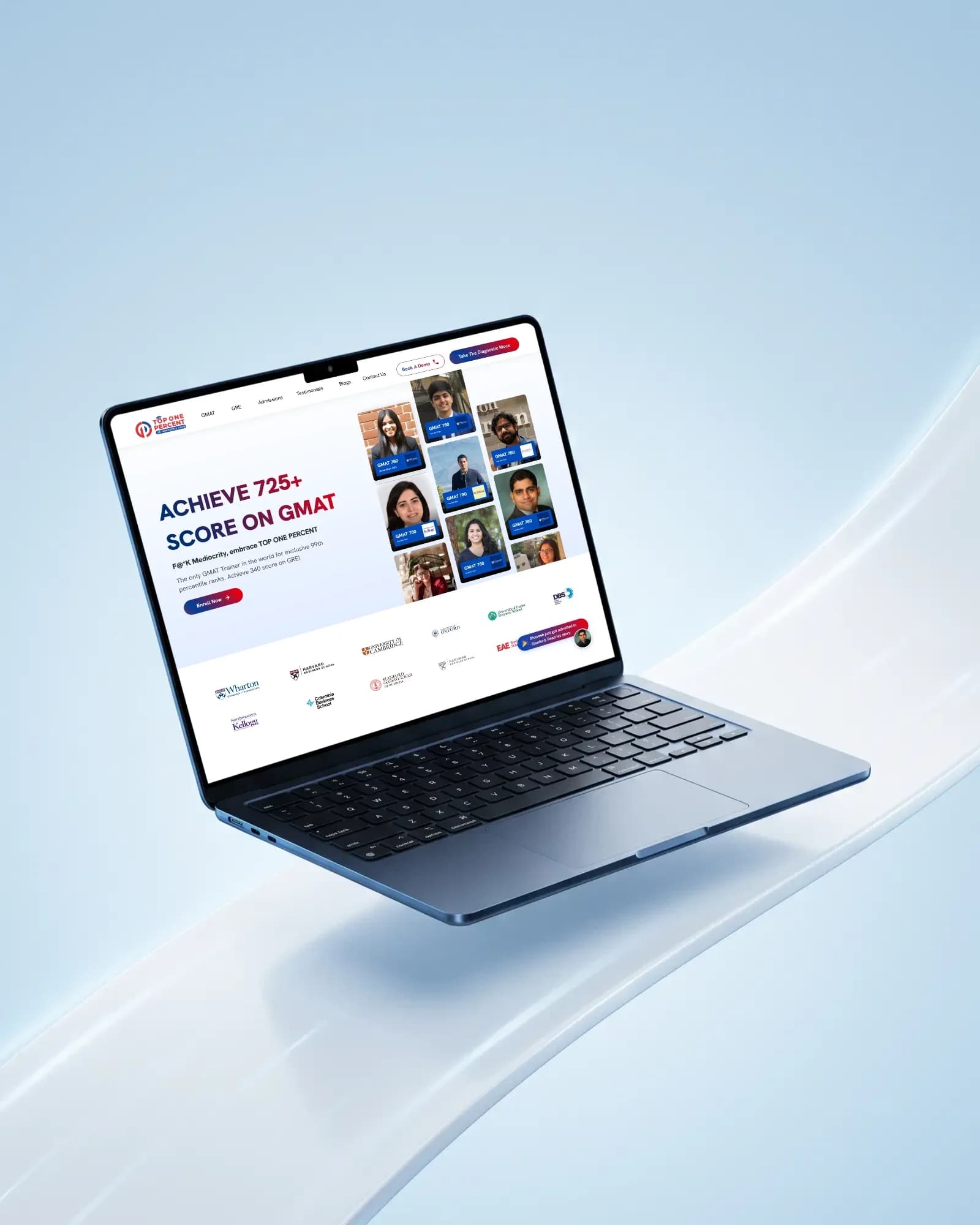 The Top One Percent homepage, 'Achieve 725+ score on GMAT', on a laptop floating over a pale blue backdrop